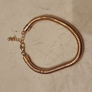 Gold tone bracelet